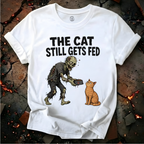 The Cat Still Gets Fed T-Shirt